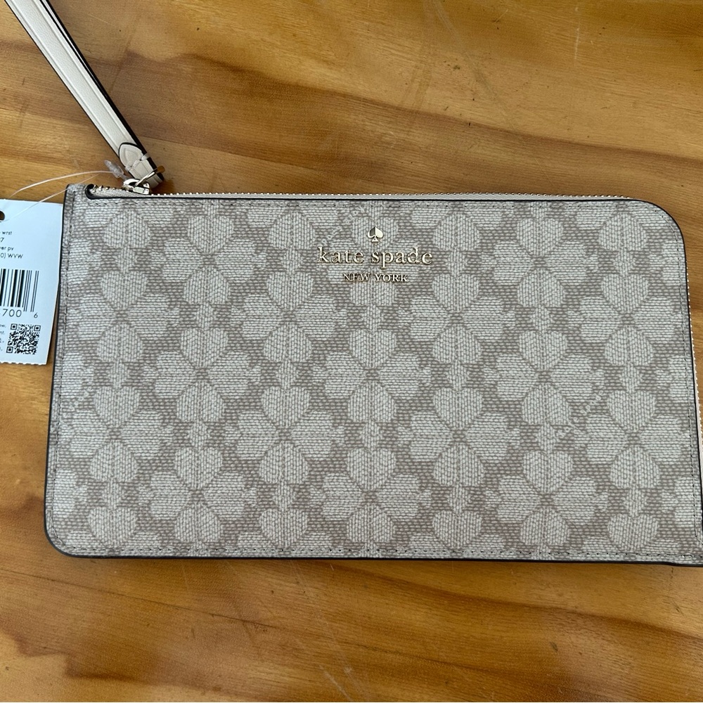 Kate Spade Cream Clutch Elegant and Versatile